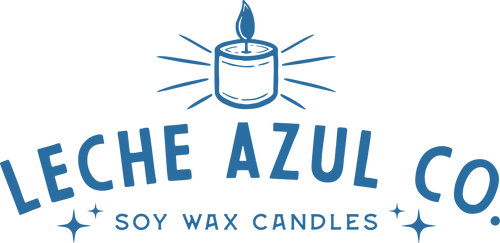Leche Azul Co. horizontal brand logo featuring an arched text layout with a glowing candle icon and the words Soy Wax Candles.